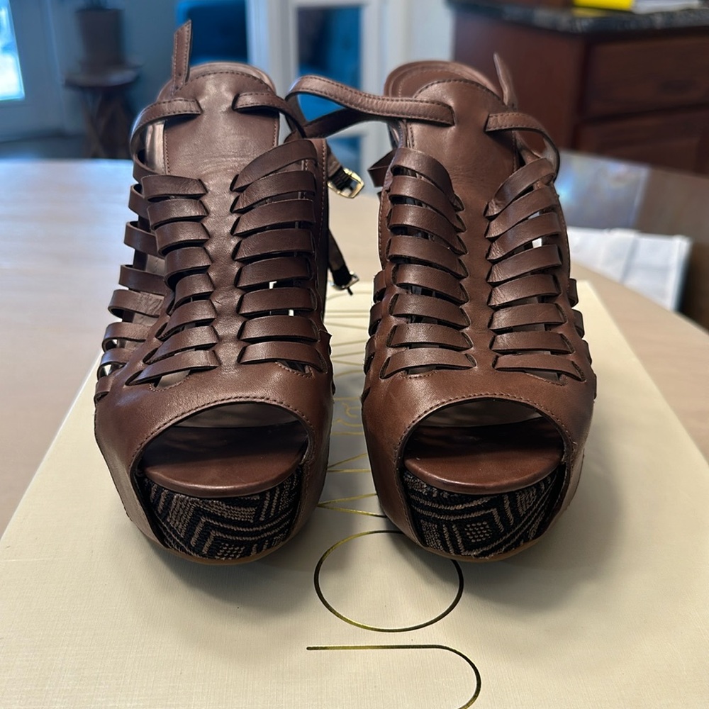 Like new, leather cage wedge